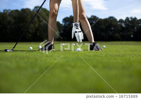 Woman playing golf on field, bright colorful vivid theme Woman playing golf on field, bright colorful vivid theme 16715889