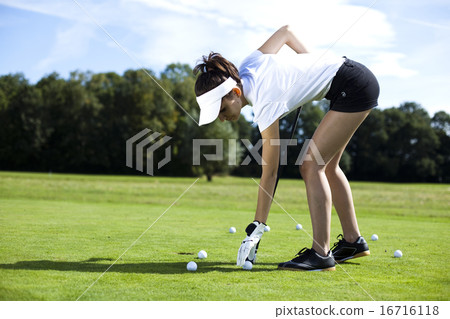 Woman playing golf on field, bright colorful  Woman playing golf on field, bright colorful  16716118