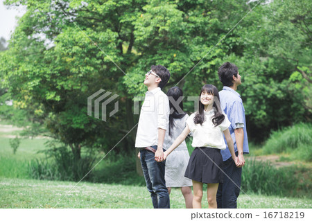 Students standing in the grassland Students standing in the grassland 16718219