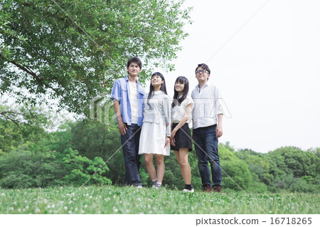 Students standing in the grassland Students standing in the grassland 16718265