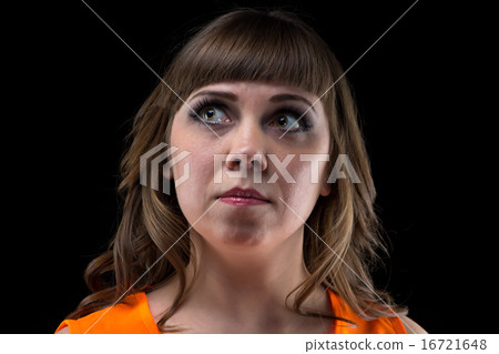 Portrait of brunette woman looking up Portrait of brunette woman looking up 16721648