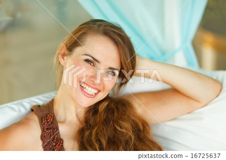 Portrait of smiling attractive woman 16725637