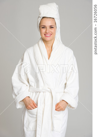 Portrait of happy young woman in bathrobe Portrait of happy young woman in bathrobe 16726056
