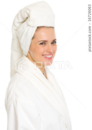 Portrait of smiling young woman in bathrobe Portrait of smiling young woman in bathrobe 16726063