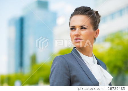 Portrait of business woman in office district Portrait of business woman in office district 16729485