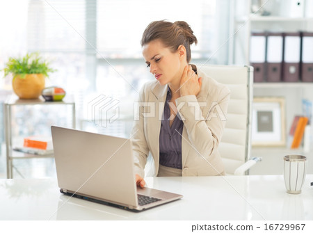 Business woman with neck ache Business woman with neck ache 16729967
