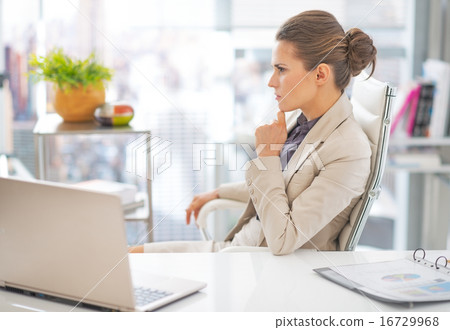 Portrait of thoughtful business woman in office Portrait of thoughtful business woman in office 16729968