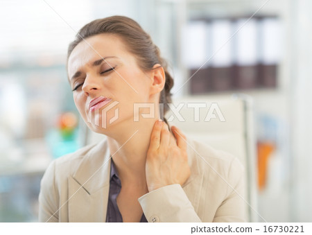 Portrait of business woman with neck ache 16730221