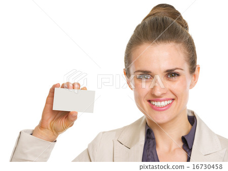 Portrait of smiling business woman showing business card Portrait of smiling business woman showing business card 16730458