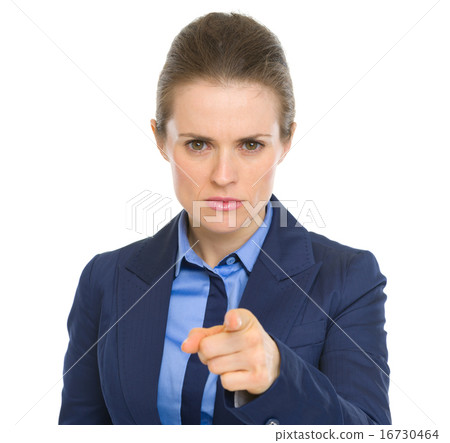 Concerned business woman pointing in camera 16730464