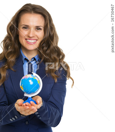 Smiling business woman holding earth globe Smiling business woman holding earth globe 16730467