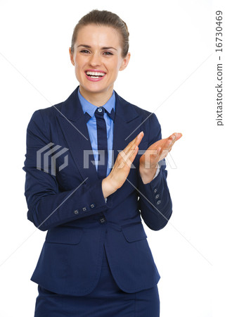 Smiling business woman clapping Smiling business woman clapping 16730469