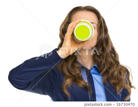 Business woman drinking hot beverage Business woman drinking hot beverage 16730470