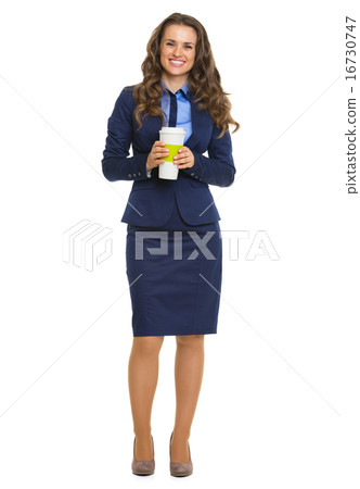 Full length portrait of smiling business woman with cup of hot b Full length portrait of smiling business woman with cup of hot b 16730747
