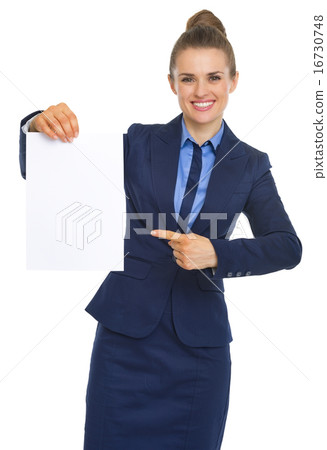 Happy business woman pointing on document Happy business woman pointing on document 16730748
