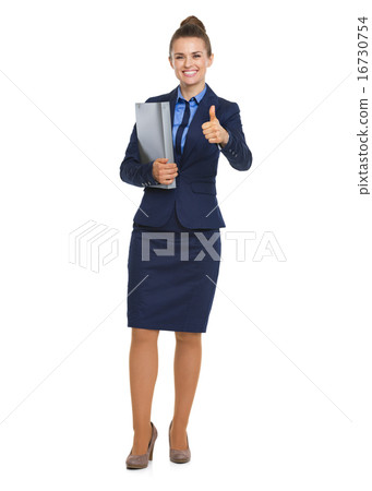 Full length portrait of happy business woman with folder showing Full length portrait of happy business woman with folder showing 16730754