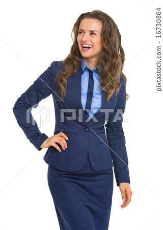Portrait of smiling business woman looking on copy space 16730864