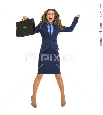 Happy business woman jumping with briefcase Happy business woman jumping with briefcase 16730866