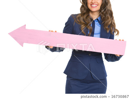 Closeup on smiling business woman pointing with arrow Closeup on smiling business woman pointing with arrow 16730867