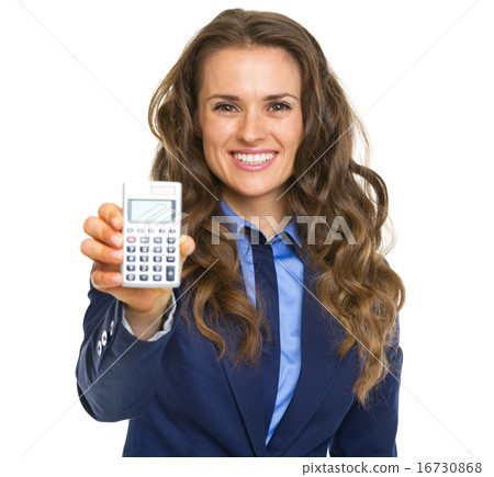 Smiling business woman showing calculator Smiling business woman showing calculator 16730868