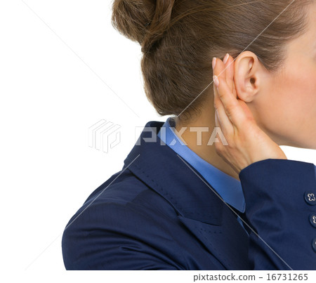 Closeup on business woman listening 16731265