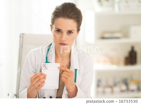 Medical doctor woman pointing on prescription Medical doctor woman pointing on prescription 16733530