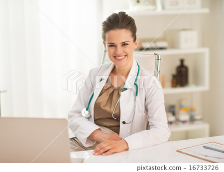 Portrait of smiling doctor woman in office Portrait of smiling doctor woman in office 16733726
