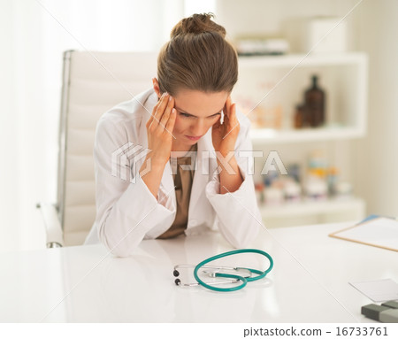 Frustrated doctor woman in office Frustrated doctor woman in office 16733761