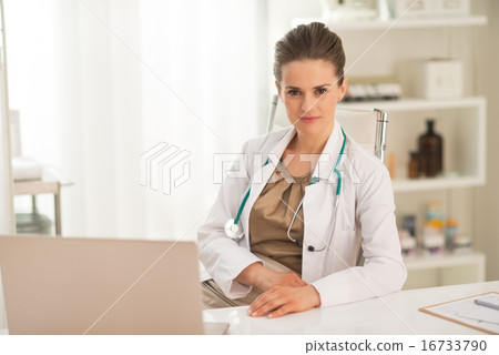Portrait of medical doctor woman in office Portrait of medical doctor woman in office 16733790
