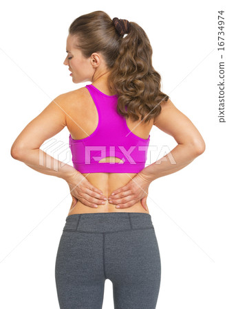 Female athlete having backache Female athlete having backache 16734974