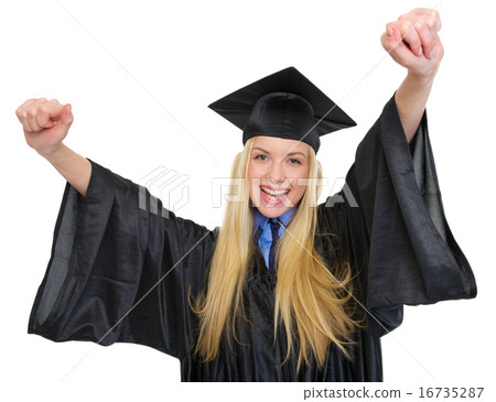 Happy young woman in graduation gown rejoicing success Happy young woman in graduation gown rejoicing success 16735287