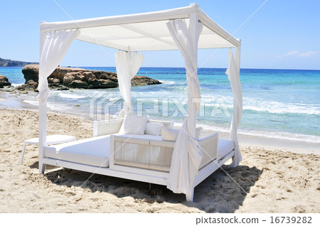 white bed in a beach club in Ibiza, Spain 16739282