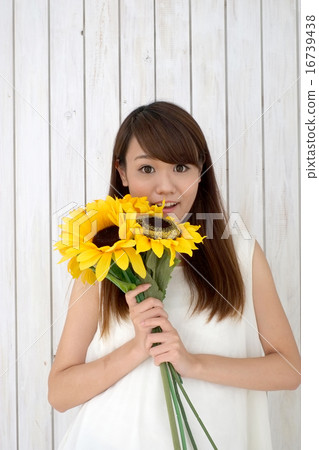 A woman with sunflower A woman with sunflower 16739438