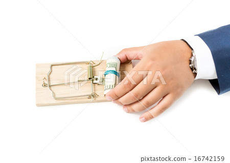 photo of businessman putting money in mousetrap 16742159