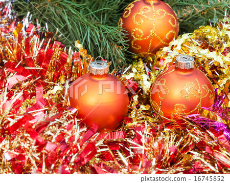 orange Christmas balls, red tinsel on Xmas tree 6 orange Christmas balls, red tinsel on Xmas tree 6 16745852