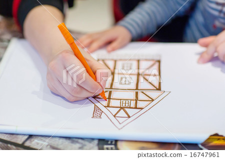 Hands of dad and little child drawing picture of house Hands of dad and little child drawing picture of house 16747961