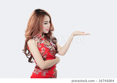 Asian model wearing Cheongsam with copy space for product or tex 16748864
