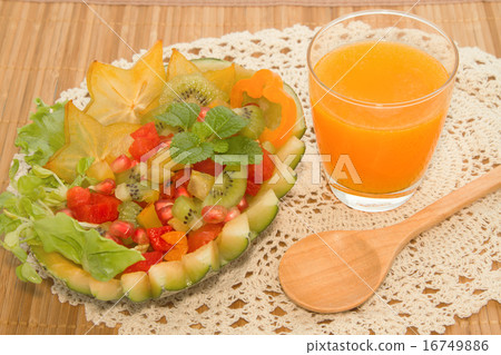 Fresh fruit salad with orange juice Fresh fruit salad with orange juice 16749886
