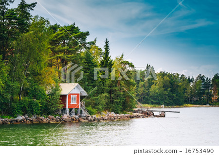 Red Finnish Wooden Bath Sauna Log Cabin On Island In Summer 16753490