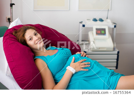 Young mother giving birth to a baby Young mother giving birth to a baby 16755364