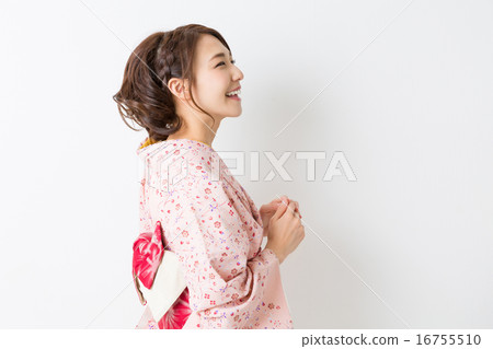A woman in a kimono 16755510