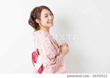 A woman in a kimono 16755511