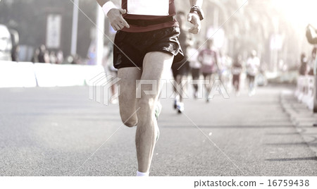 Marathon running race, people feet on city road 16759438