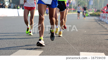 Marathon running race, people feet on city road 16759439