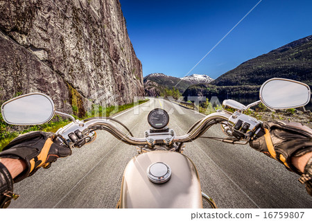Biker First-person view, mountain serpentine. Biker First-person view, mountain serpentine. 16759807