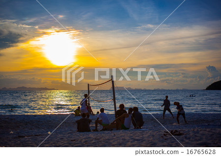 Beach Volleyball at sunset and pier 16765628