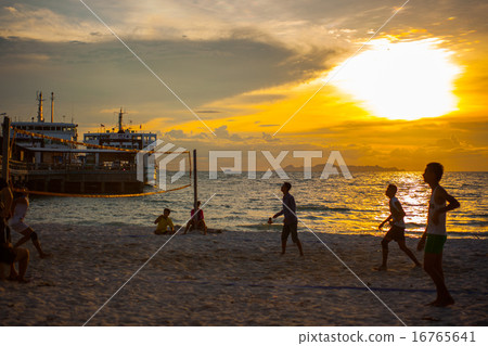 Volleyball game at Koh Samui Pier in amazing sunset, Thailand Volleyball game at Koh Samui Pier in amazing sunset, Thailand 16765641