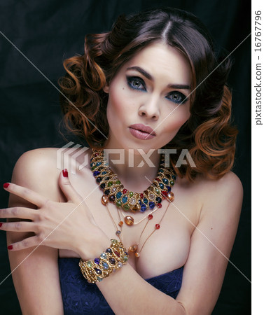 beauty rich woman with luxury jewellery looks like mature close up 16767796