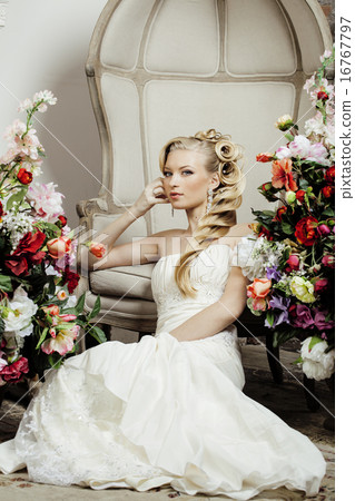 beauty young bride alone in luxury vintage interior with lot of flowers beauty young bride alone in luxury vintage interior with lot of flowers 16767797