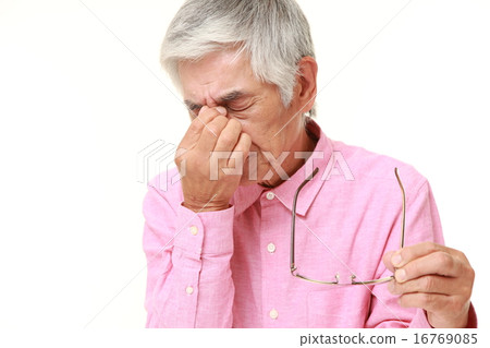 Elderly with tired eyes Elderly with tired eyes 16769085